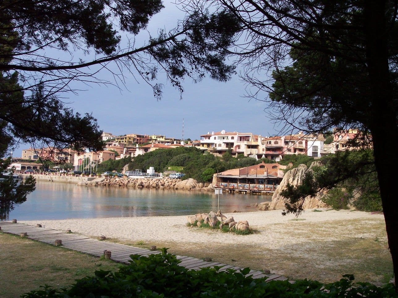 Porto Cervo harbour and the pale architecture of the basin.